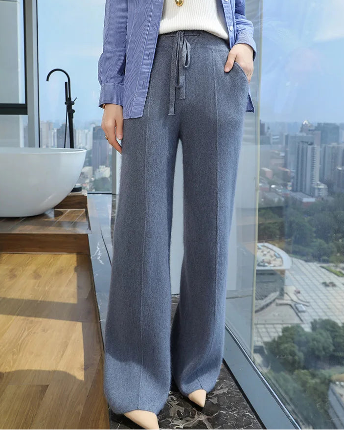 Mink cashmere knit wide leg pants with a high drawstring waist and deep pockets, designed for soft office-ready warmth from desk to dinner.