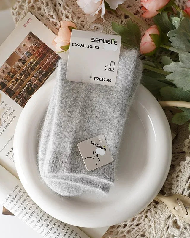 Women's Wool and rabbit hair mid-tube socks featuring a sculpted mid-tube cuff, plush blend fabric, and relaxed stretch knit, perfect for delivering poised warmth in cold office environments.