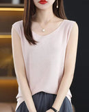 Women's side-slit sleeveless knit vest featuring a breathable silk-linen blend, relaxed V-neck, and side-split hem for effortless summer layering.