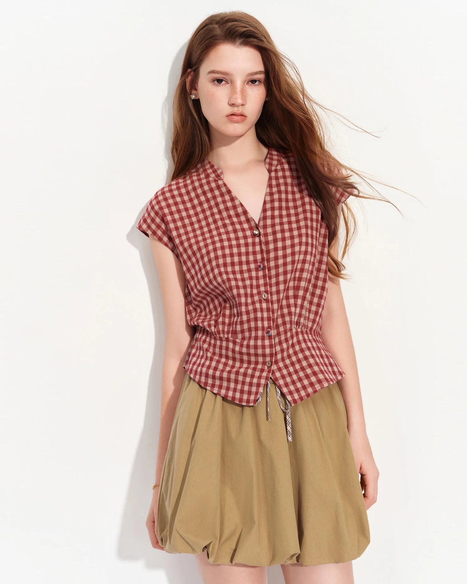 Women's V-neck Sleeveless cotton blouse made from lightweight cotton-viscose blend, featuring a slim fit silhouette and breathable fabric for effortless summer elegance and daily comfort.