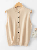 A sleeveless cardigan vest crafted from Australian merino wool, featuring a round neck and full button-front closure for a classic, versatile layer.