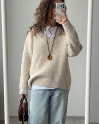 A Loose Soft V-Neck Sweater With A Scarf