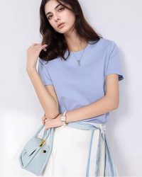 Women’s solid white crew neck t-shirt, short sleeve classic fit, soft cotton top for casual everyday wear.