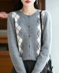 Its medium weight knit, regular silhouette, and full sleeves provide comfortable coverage, while patchwork inspired jacquard detailing lends subtle character.