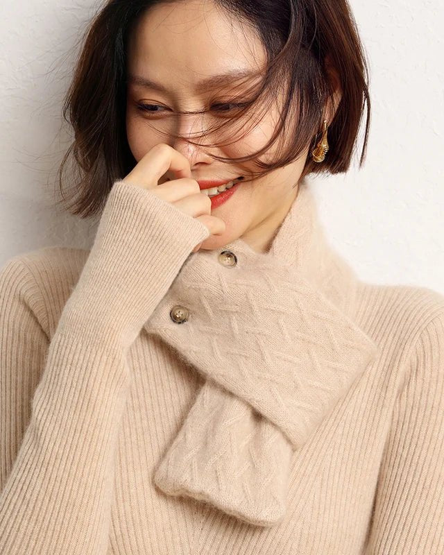 Slim in profile yet rich in warmth, this cashmere knit scarf is the kind of piece that disappears into an outfit while elevating it. 