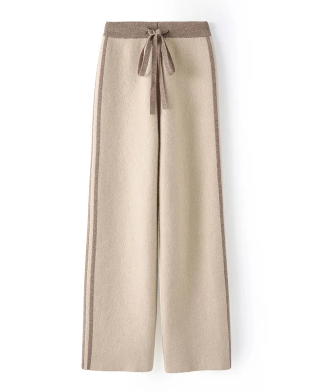 Crafted from a premium wool blend, these straight-leg trousers move with ease and settle into a clean, fluid drape.