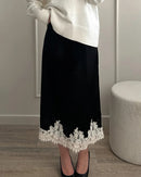 Women's satin A-line midi skirt featuring breathable polyester fabric, intricate lace patchwork panels, and a side zipper for a refined fit in summer office wear.