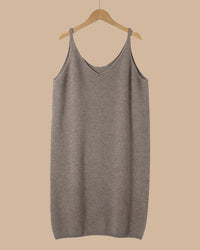 Longline merino wool cami for women with slim shoulder straps, sleeveless loose knit silhouette and extra length, a warm fall-winter layering top for everyday outfits.