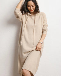 100% cashmere hooded knit dress in a relaxed straight silhouette. Exceptionally soft, warm and lightweight — a luxury layering piece for autumn and winter.