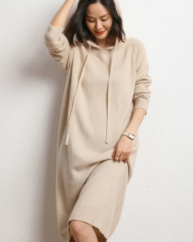 100% cashmere hooded knit dress in a relaxed straight silhouette. Exceptionally soft, warm and lightweight — a luxury layering piece for autumn and winter.