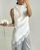 Satin high neck sleeveless vest top with delicate lace trim and irregular hem. Lightweight polyester — chic and feminine long tank for summer party and casual wear.