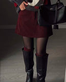 Women's  corduroy slim-fit mini skirt featuring a breathable woven fabric, clean waistband, and side pockets for a polished look in autumn and winter.