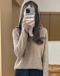 100% merino wool hooded pullover sweater. Heavyweight, medium stretch — a soft, warm, casual autumn winter knitwear top for women.