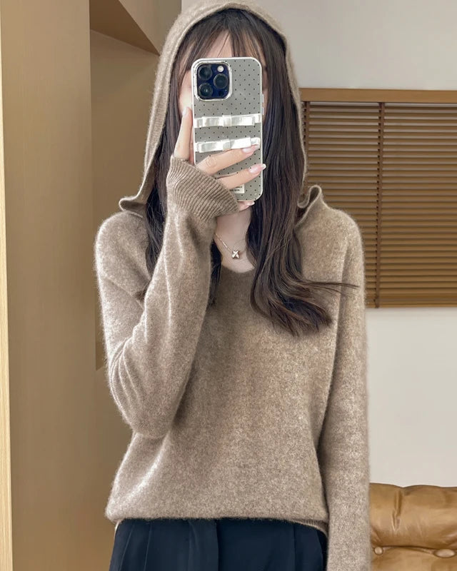 100% merino wool hooded pullover sweater. Heavyweight, medium stretch — a soft, warm, casual autumn winter knitwear top for women.