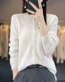 pure merino wool hollow-knit cardigan. Lightweight, breathable, and effortlessly elegant — perfect for spring and autumn layering.