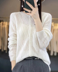 pure merino wool hollow-knit cardigan. Lightweight, breathable, and effortlessly elegant — perfect for spring and autumn layering.