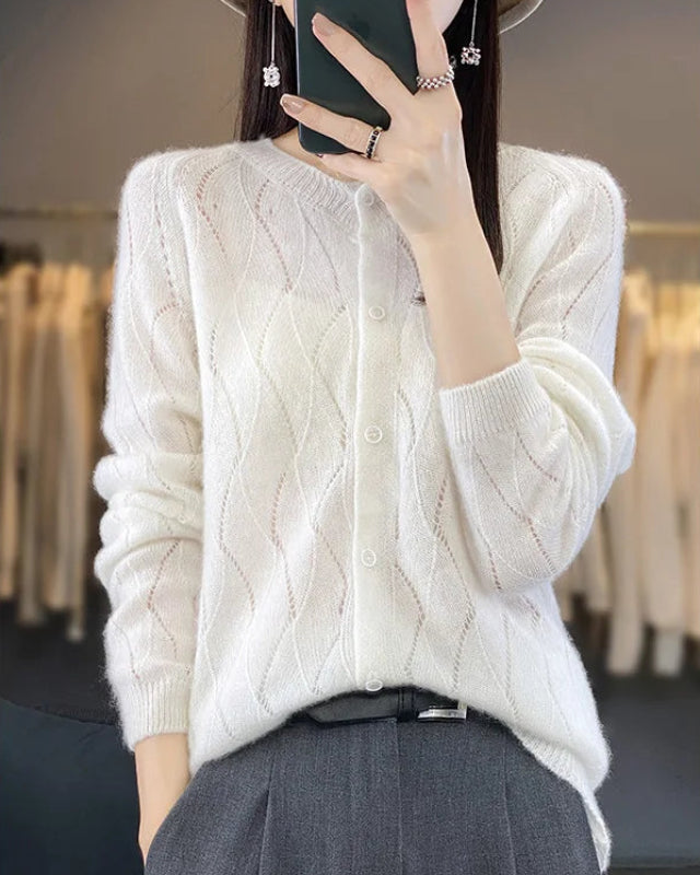pure merino wool hollow-knit cardigan. Lightweight, breathable, and effortlessly elegant — perfect for spring and autumn layering.