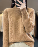 A diamond-knit wool mock-neck sweater with mock neck, diamond knit, ribbed cuffs and hem, regular fit, long sleeves and stretch, designed for a cozy winter layering look that pairs from sneakers to boots.