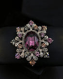 Exquisite vintage crystal brooch in gold tone, elegant round pin with sparkling faceted stones and ornate metalwork, perfect for formal or evening wear.