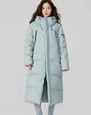 Longline hooded duck down coat with white duck down fill, horizontal quilting, integrated hood, front zip and long zip pockets, a warm below-knee fall-winter coat for commutes.