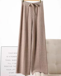 100% merino wool solid elastic waist wide leg knit trousers. Warm, soft, and medium stretch — cosy casual autumn winter knitted pants for women.