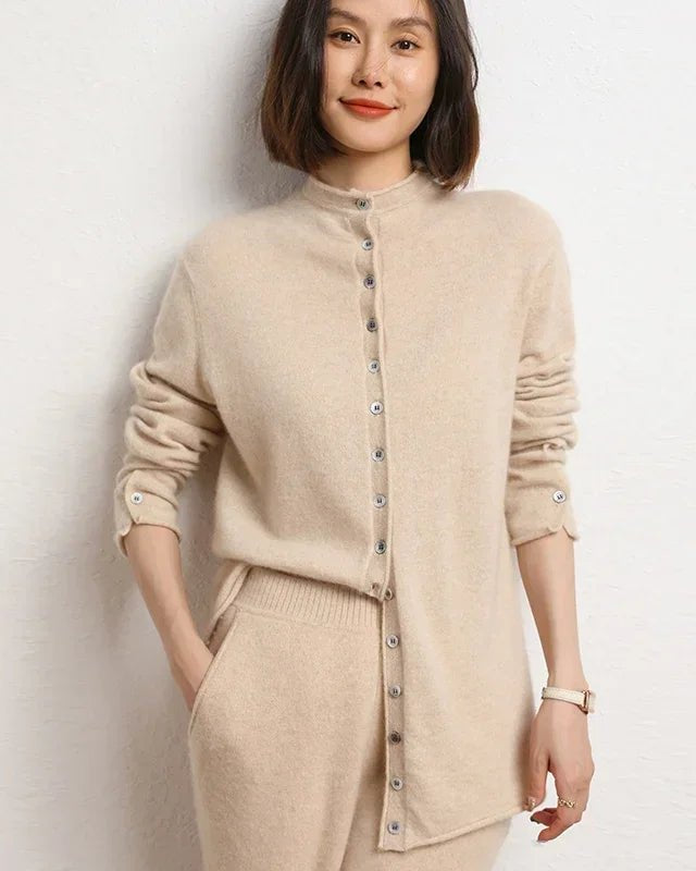 Soft  Cashmere cardigan, stand-up collar, button front, ribbed cuffs—lightweight layer for crisp fall commutes or WFH comfort.