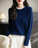 A layered-look wool-blend knit top with crewneck, layered-look design, regular fit and long sleeves, designed for a cozy winter layering look that pairs from sneakers to boots.
