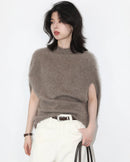 Wool cashmere turtleneck sleeveless loose knit sweater vest. 90% wool blend, medium stretch, opaque — an elegant retro casual autumn pullover for women.