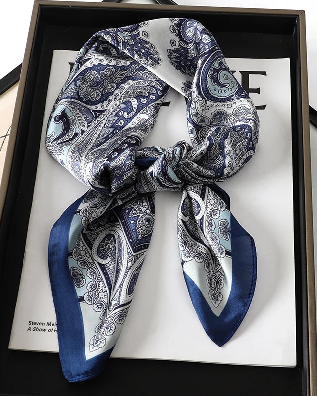 The square scarf is one of fashion's most enduring formats, and this paisley-printed version understands why.