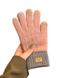 These warm knit gloves bring thoughtful function to cold-weather dressing through a textured cable pattern, responsive touchscreen fingertips, and an easy elastic cuff.