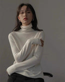 100% cashmere turtleneck loose knit sweater. Heavyweight, slight stretch, and luxuriously soft — a premium casual autumn winter pullover for women.