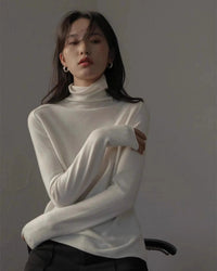 100% cashmere turtleneck loose knit sweater. Heavyweight, slight stretch, and luxuriously soft — a premium casual autumn winter pullover for women.