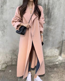 The relaxed shape leaves room for layering, while an adjustable waist offers a more defined finish.