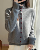 Its regular fit sits comfortably over everyday separates, while long sleeves complete the clean silhouette.