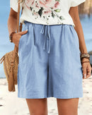 Women's high-waisted linen drawstring shorts, featuring breathable pure linen and a button fly for relaxed confidence from morning yoga to afternoon errands.