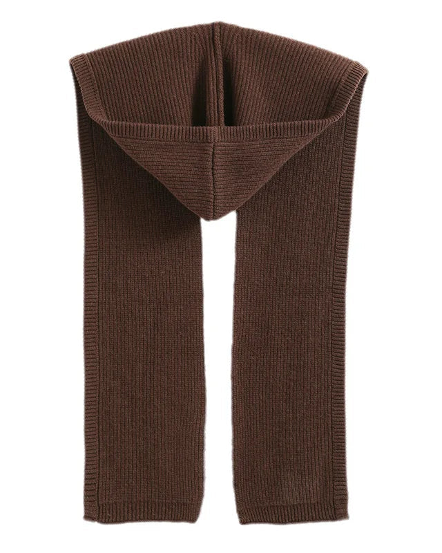 A merino wool hooded scarf with jacquard knit texture, seamless construction and generous drape, designed for a cozy winter look that pairs from sneakers to boots.