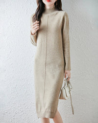 A 100% merino wool turtleneck midi dress with a straight H-line and full sleeves, designed for poised ease from a cold morning commute to dinner.