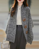 Merino wool solid knit shawl scarf. Soft, warm, and seamlessly knitted — a comfortable casual autumn winter wrap for women.