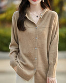 100% merino wool solid hooded pocket long knit cardigan. Soft, slight stretch, and regular fit — a casual elegant autumn winter knitwear coat for women.