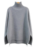 A thick cashmere mock neck sweater with a heavyweight 7GG knit and loose fit, designed for solid winter warmth that drapes easily over layers.