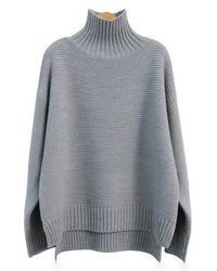 A thick cashmere mock neck sweater with a heavyweight 7GG knit and loose fit, designed for solid winter warmth that drapes easily over layers.