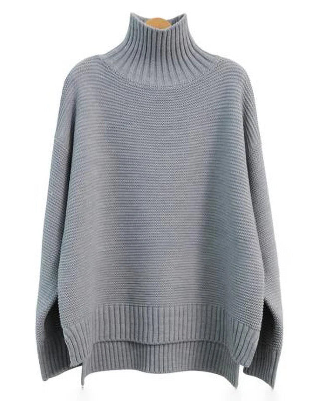A thick cashmere mock neck sweater with a heavyweight 7GG knit and loose fit, designed for solid winter warmth that drapes easily over layers.
