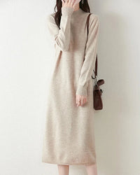 A mid-calf merino wool mock neck knit dress with a straight cut, designed for soft single-thread warmth that layers easily from commute to dinner.