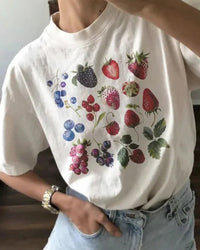 A celebration of nature's most vibrant details, this fruit graphic tee offers a soft, wearable canvas for everyday expression.