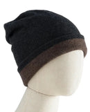 A double-faced cashmere and wool beanie with a two-tone knit and close fit, designed to cover the ears for lightweight warmth that packs easily.