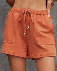 Women's high-waist drawstring casual shorts, featuring a soft stretch polyester blend and side pockets for relaxed comfort on morning walks or weekend brunch outings.