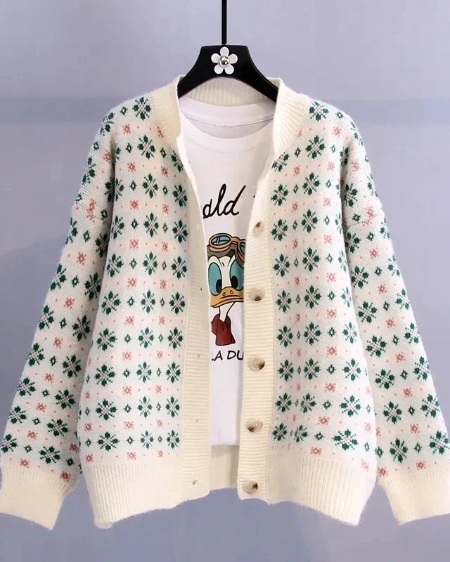 Women's Floral vintage knitted cardigan featuring an O-neck design, loose fit silhouette, and all-over floral pattern, perfect for adding effortless vintage charm to office or casual air-conditioned environments.