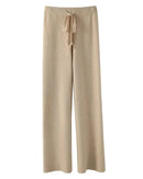 A stretch cotton blend wide-leg pant with mid waist, elastic waistband and ankle-length fit, designed for a casual everyday look that pairs from sneakers to boots.