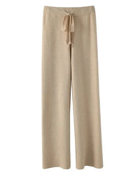 A stretch cotton blend wide-leg pant with mid waist, elastic waistband and ankle-length fit, designed for a casual everyday look that pairs from sneakers to boots.