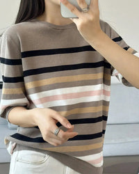This cotton knit top is one of them — a clean, breathable everyday essential that carries a quiet patchwork detail for those who look closely. Understated craft, effortless wear.